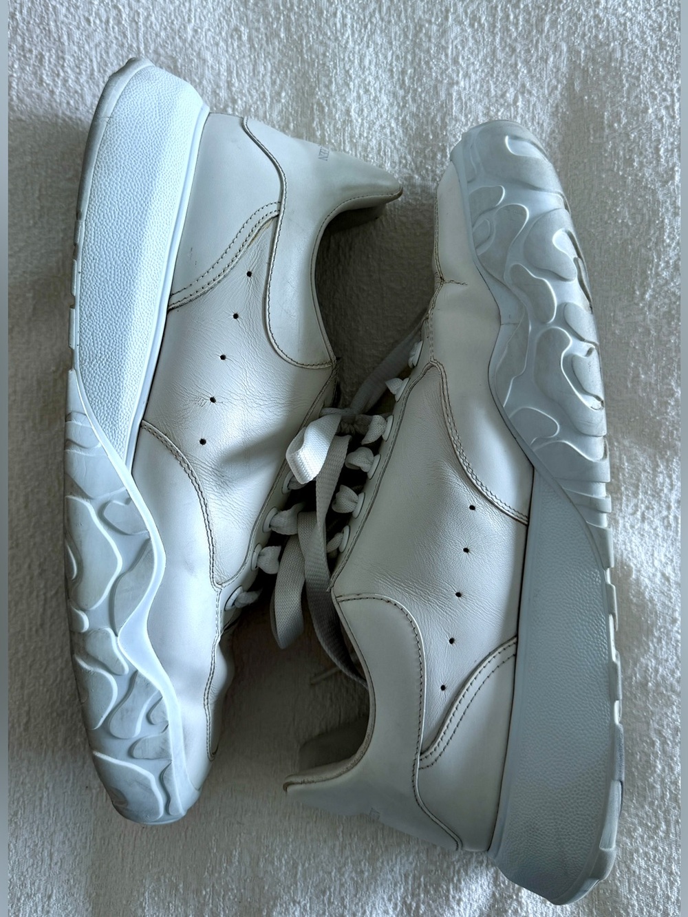 men’s white court trainer sneakers.